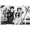 Mrs. Frank Coffyn (left) and an unidentified woman posing in an early Wright Model B at an air meet.