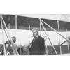 Frank Coffyn in front of an early Wright Model B aircraft after a flight.  Inscription handwritten on reverse:"Just after a flight 2,000 high on Dec 18, '10. Simms Field Dayton O."