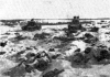 Dead Russian troops and destroyed tanks