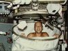 Astronaut Conrad in Skylab shower
