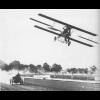 Stunt flyer Lincoln Beachey races a car