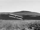 The 1902 Glider soaring.