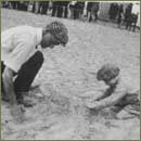 Frank and Kingsland Coffyn playing on the beach.