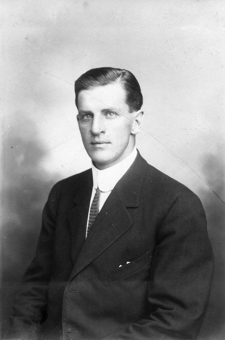 Portrait photograph of Frank Coffyn.  Photograph has a pencilled 'X' through it, made while the picture was pasted into the scrapbook.