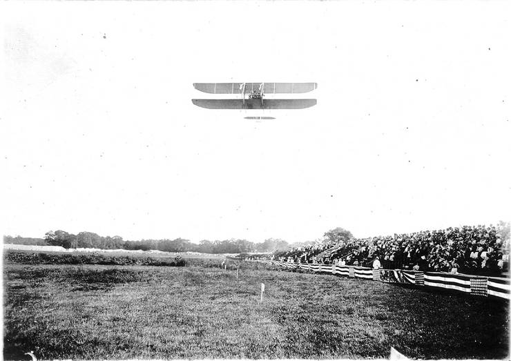Wright pilot and passenger in flight at exhibition�possibly Arch Hoxsey and Theodore Roosevelt.