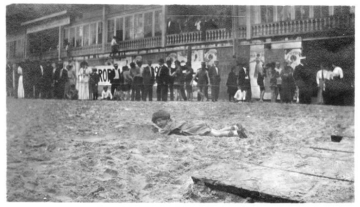 Kingsland Coffyn lying in the sand in Atlantic City, New Jersey.