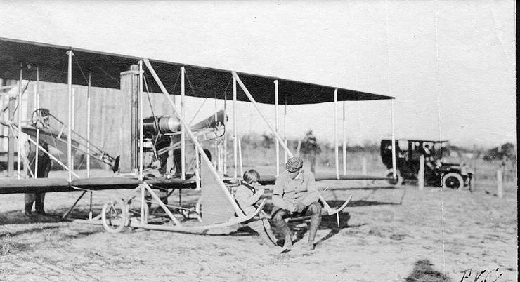 Frank and Kinsgland Coffyn sitting on a Wright Model B.