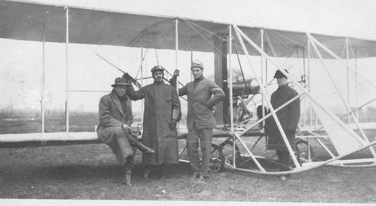 Frank Coffyn (3rd from left), E. S. L. Randolph (2nd from left), and two men in front of early Wright Model B.