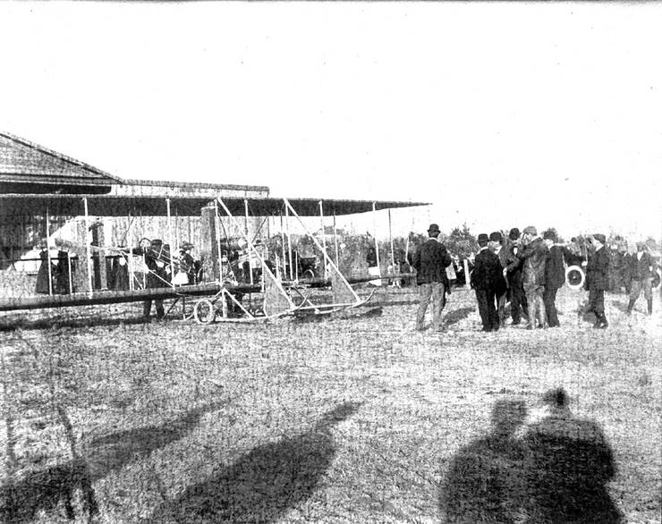 Frank Coffyn and a group of men in front of a Wright Model B.