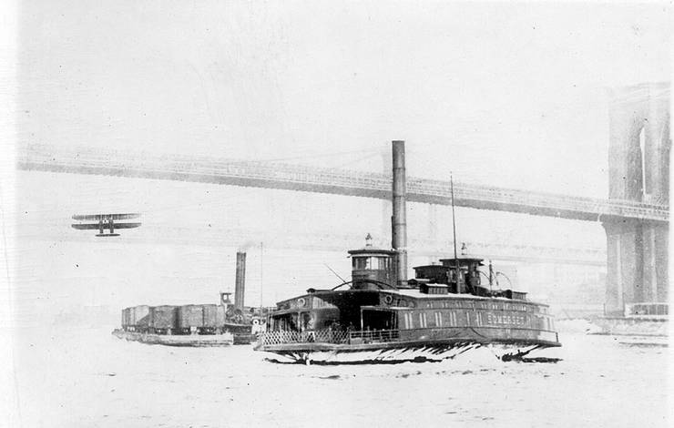Frank Coffyn flying under the Brooklyn Bridge, New York, 1912.