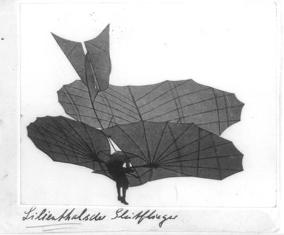 Lilienthal biplane glider in flight, 1895. Shows structure of the glider with the double sailing surface.