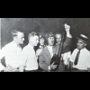 Airmail personnel look at film of Air Mail