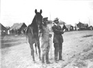 Lieutenant Frank P. Lahm and Glenn H. Curtiss watching the flight of Orville Wright at Fort Myer, Virginia, 1909.