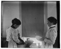  Katharine Wright and Harriet Silliman, busy in the kitchen. 
